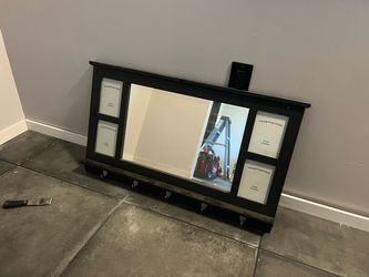 Wood mirror with hooks