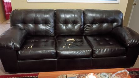 BROWN LEATHER COUCH