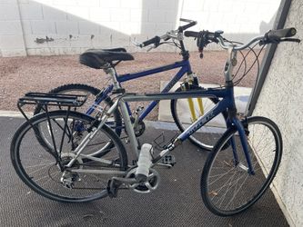 One men's Raleigh M60 and one women's Trek.