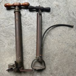 Pair of antique brass tire pumps $175
