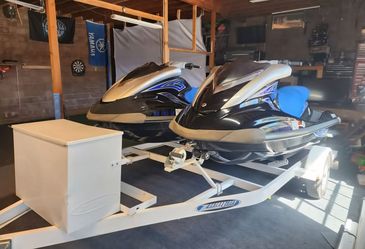 Pair of Yamaha waverunners and trailer.