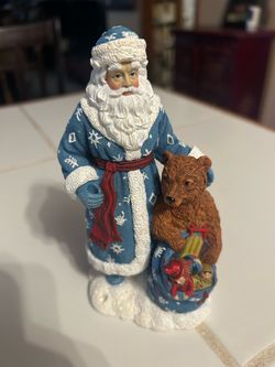 vintage Pipka "Russian Santa" figurine (Design #13916) from the Memories of Christmas collection, featuring Santa in a blue coat with a brown bear