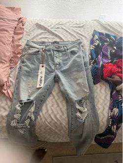 brand new purple jeans