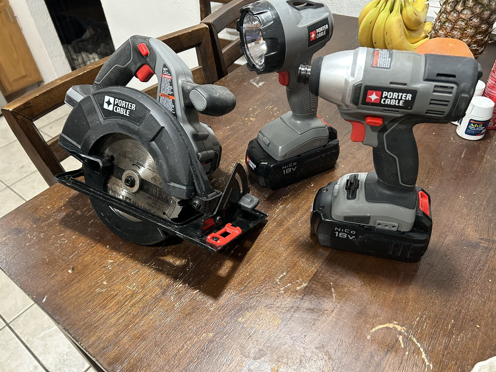 Porter Cable 18 Volt Impact, Saw , Flashlight And Two Batteries
