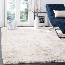 SAFAVIEH's Paris Collection Handmade 8’6” x 12’ Are Rug