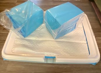 Never used indoor potty trainer for small pets With Potty pads  Like New 