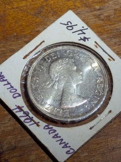1(contact info removed) Canadian silver commemorative silver dollar