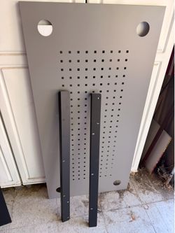 Metal pegboard w optional mounting brackets.