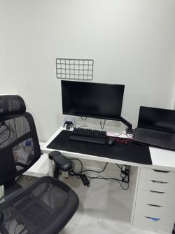 Includes Desk, Monitor, Laptop, Keyboard, And Office Chair.