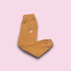 Nike sportswear club fleece tapered sweatpants gold youth large 