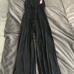 Clothing. Designer Vince Camuto  New  Black Jumpsuit Size Small