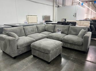 BRAND NEW GRAY CORDUROY SECTIONAL WITH OTTOMAN