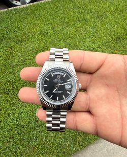 black face rolex day date