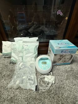 Spectra S1 portable breast pump and milk bags