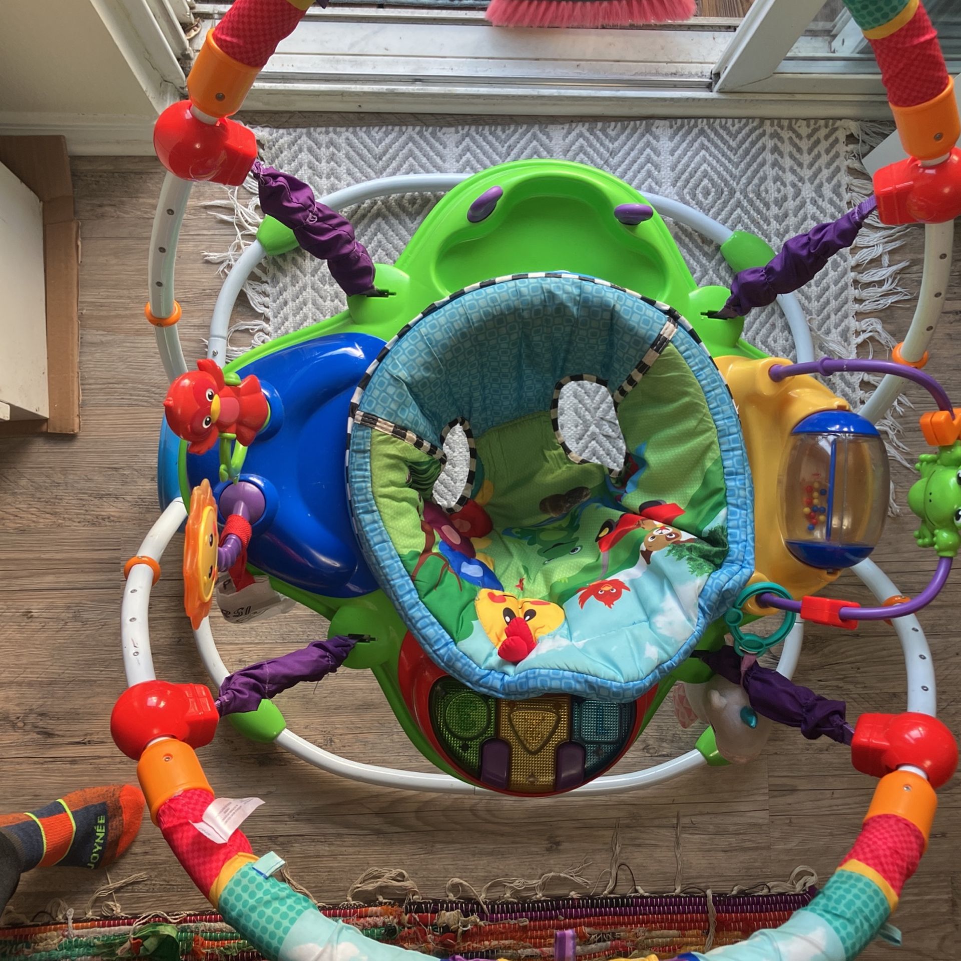 Baby Einstein Neighborhood Friends Activity Jumper with Lights and Melodies