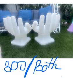 Chairs formed as hands $300