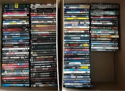 Lot of 128 DVD's AND a FREE DVD Player!