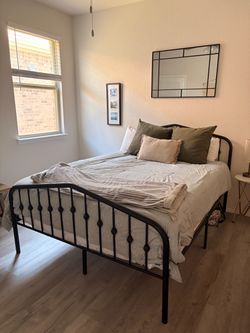 Queen bed - mattress + bed frame. Barely used