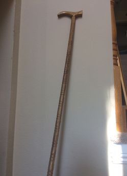 Vintage wooden cane new very solid very sturdy and very classy.
