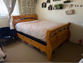 Wooden sleigh bed frame