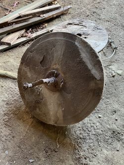Antique grinding wheel