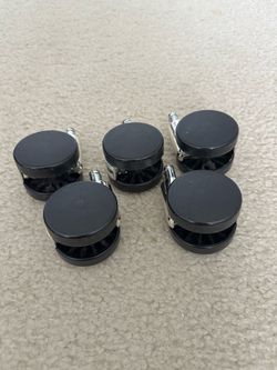 Chair casters, set of 5, black with chrome stems, good condition.