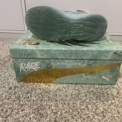 Puma Basketball Shoes That Are Teal And Gold