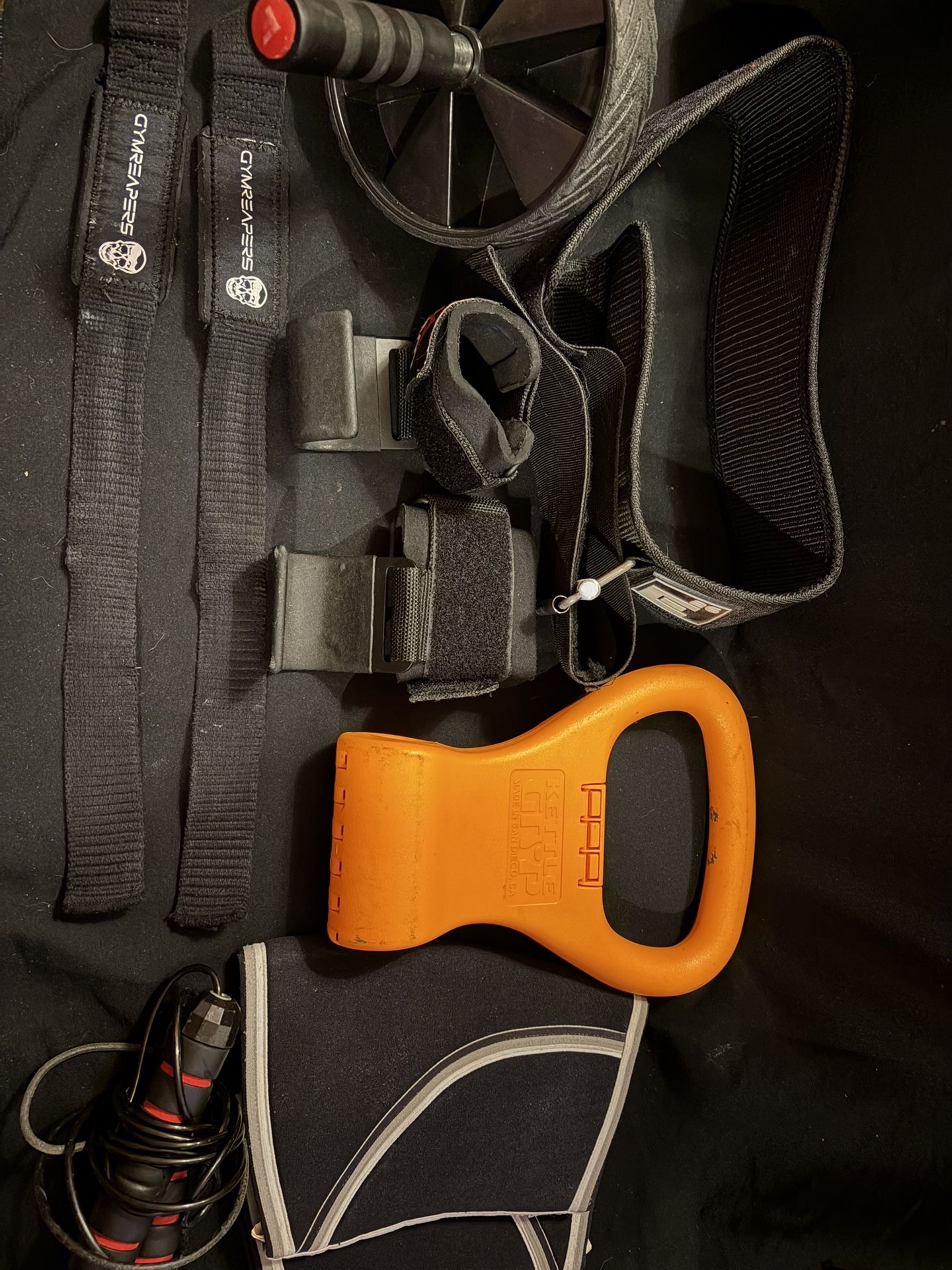 Weight Lifting Set- Kettle Grip, Wrist Hooks, Belt, jump rope, knee braces, Push up wheel, Wrist Straps - used- LOTL
