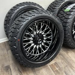 NEW 22x12 gloss black/milled fittipaldi wheels wrapped in AMP AT 33x12.50r22 tires
