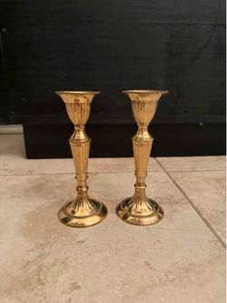 Brass and gold candle sticks