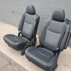 BRAND NEW BLACK LEATHER BUCKET SEATS WITH SEATBELTS 