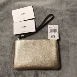 Coach gold wristlet NWT