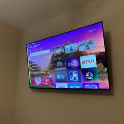 55" TCL smart TV in excellent condition.