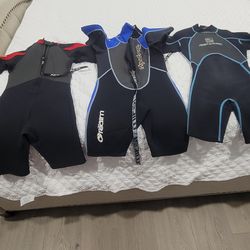 Some water suits for surfing and swimming.