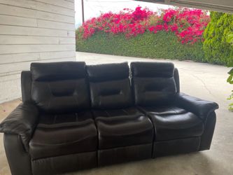 Dark brown leather sofa