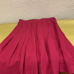 Beautiful red , fuchsia color pleated skirt , size 8 ,20” length and 28” waist , new , no tag