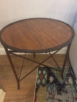 Rustic round wood/iron end table