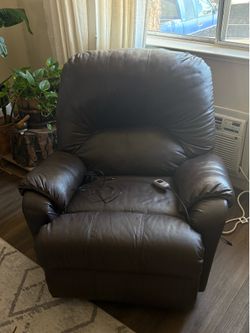 Recliner with build in massager