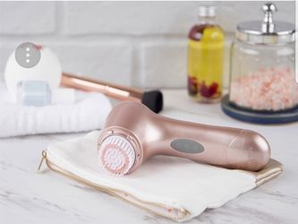 Rose gold facial brush