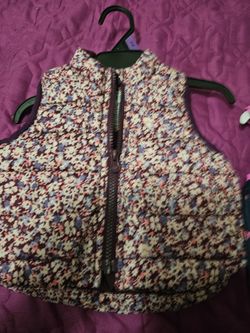 2 Baby Gap Vest