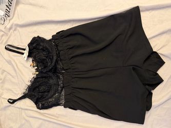Black romper size medium with tags
