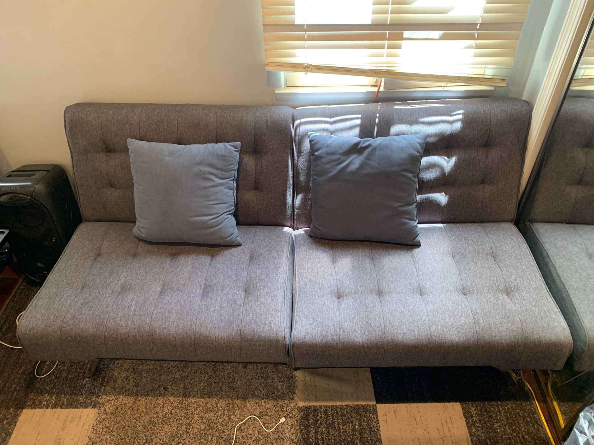 Grey IKEA foldable futon couch
