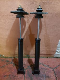 04 08 Nissan Maxima rear shocks with top mount.