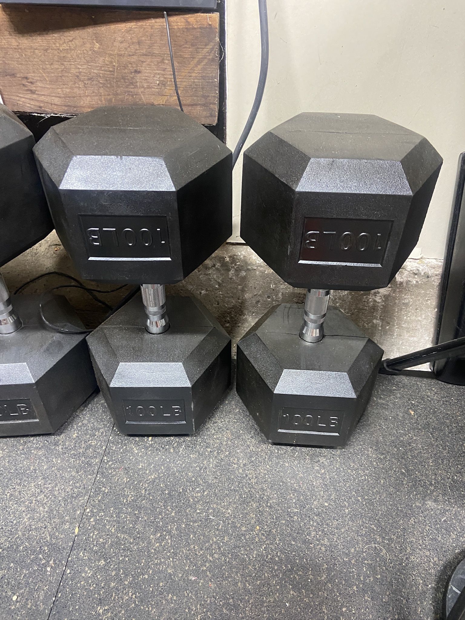 100 pound rubber hex dumbbells