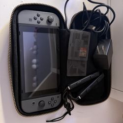 Nintendo Switch+ Case+Charger+2 games