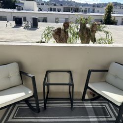 Patio Set Includes Chairs Table And Rugs