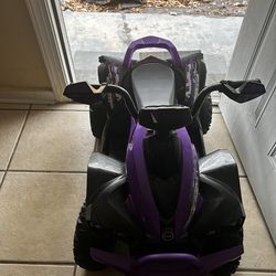 Purple four wheeler ( girls )