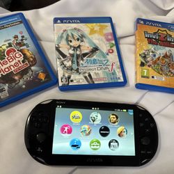 Sony PlayStation PS Vita PCH-2001 Black with games and more.