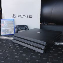 PS4 Pro 1TB Complete Bundle – Great Condition + Box + Game