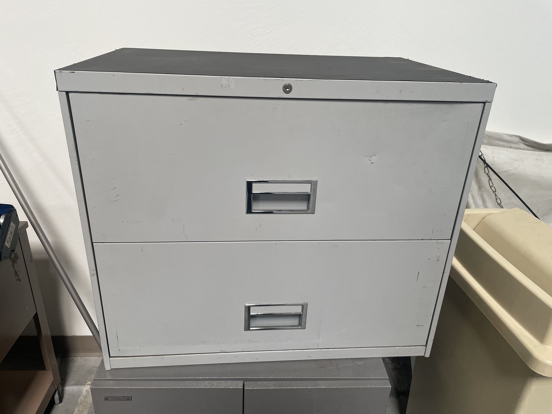 2 draw file cabinet  🗄️ with key 🔑 
